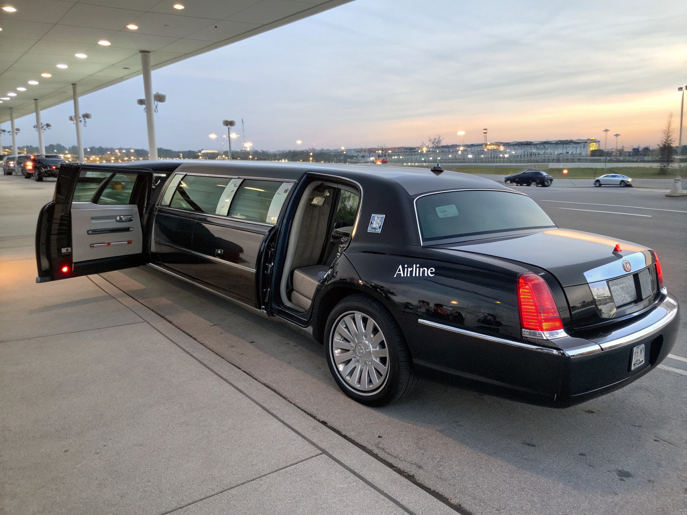 Luxury black stretch limousine parked at Vancouver terminal