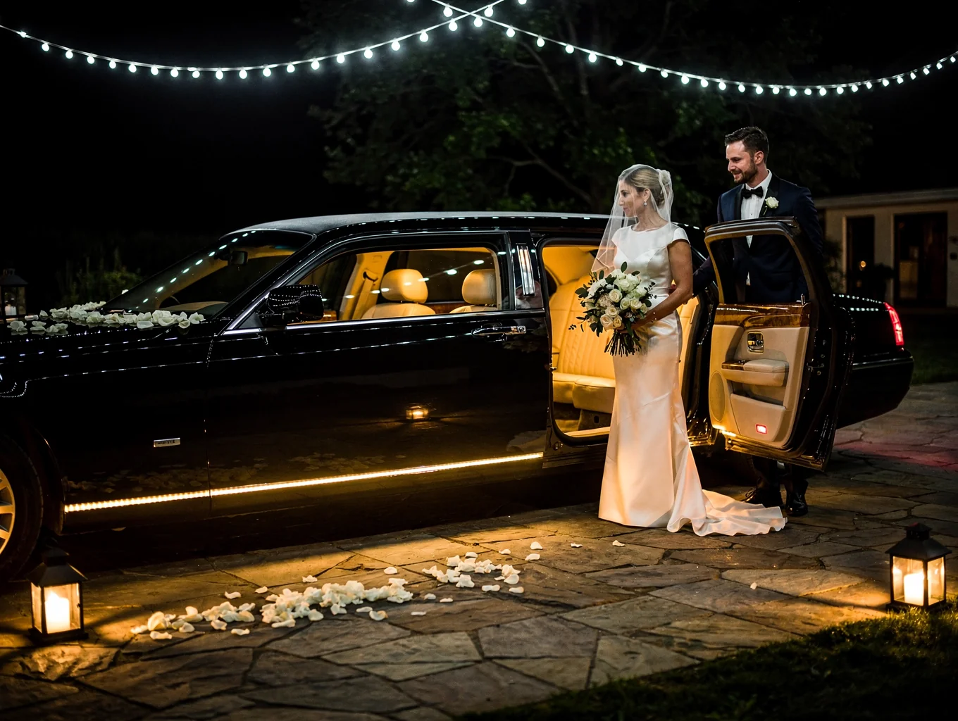 Luxury wedding limousine parked at an elegant venue